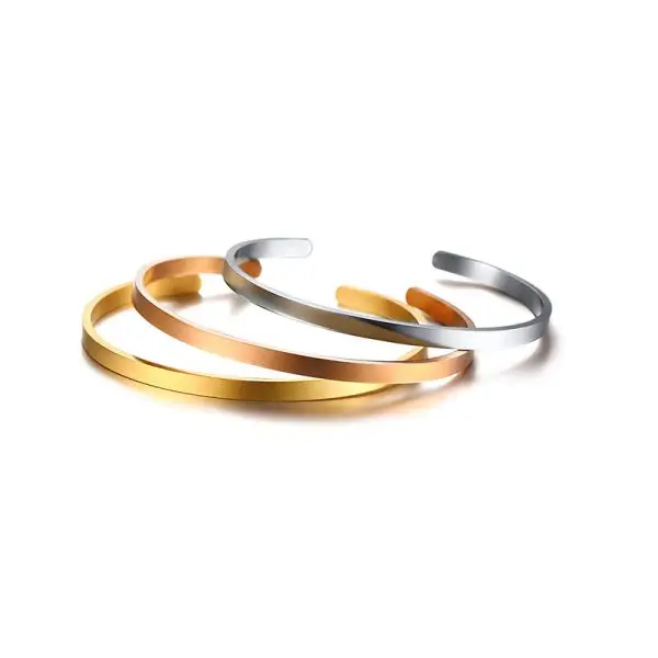 Custom engraved cuff bracelet in gold, silver, and rose gold