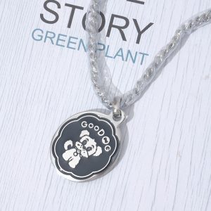 custom dog tag pendants in shield, round, and bone shapes