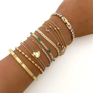 Elegant womens bracelet set with charms, beads, and crystals