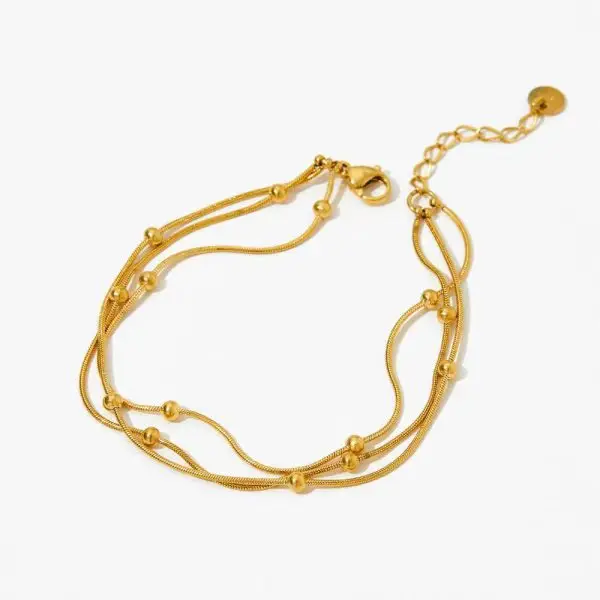 Elegant women's bracelet set with charms, beads, and crystals