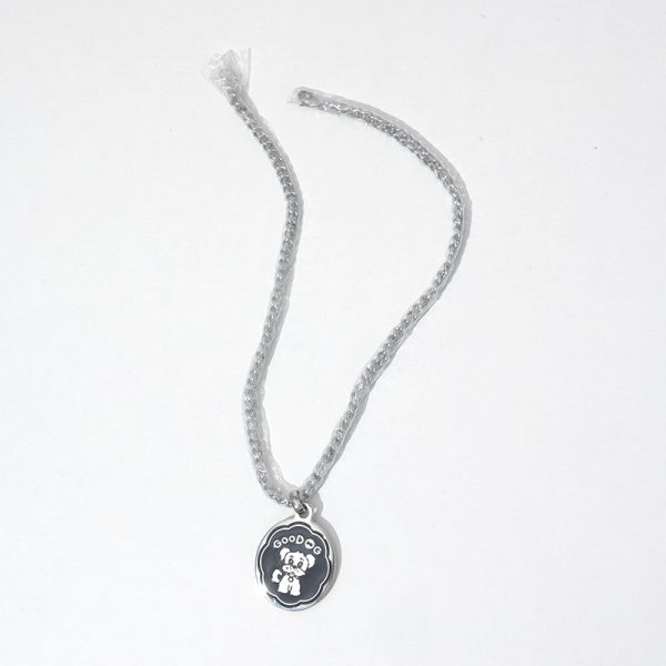 custom dog tag pendants in shield, round, and bone shapes