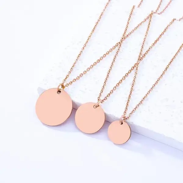 custom engraved round disc pendant necklace in gold, silver, and rose gold