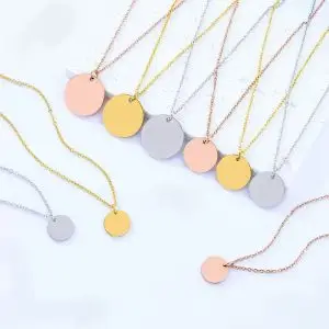 custom engraved round disc necklace in gold, silver, and rose gold