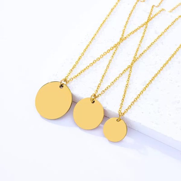 custom engraved round disc pendant necklace in gold, silver, and rose gold