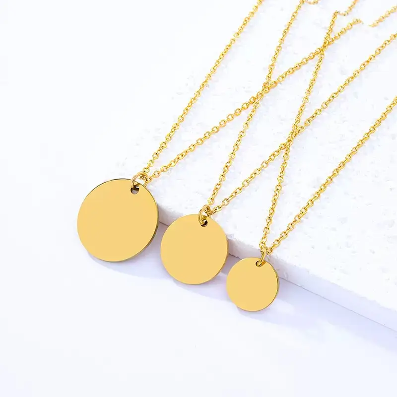 custom engraved round disc pendant necklace in gold, silver, and rose gold