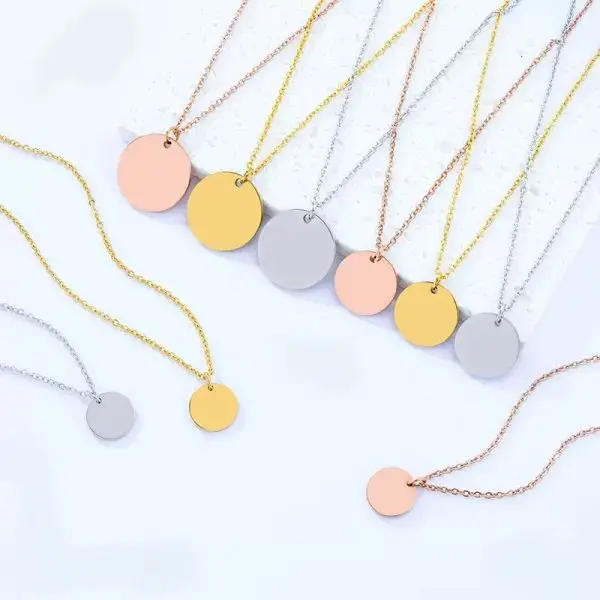 custom engraved round disc necklace in gold, silver, and rose gold