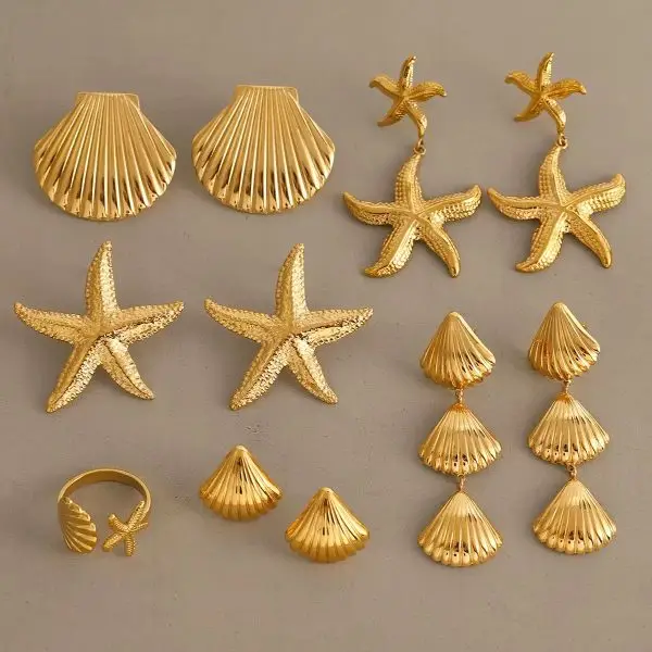 Gold starfish shell earrings, studs, and ring set with beach-inspired summer design